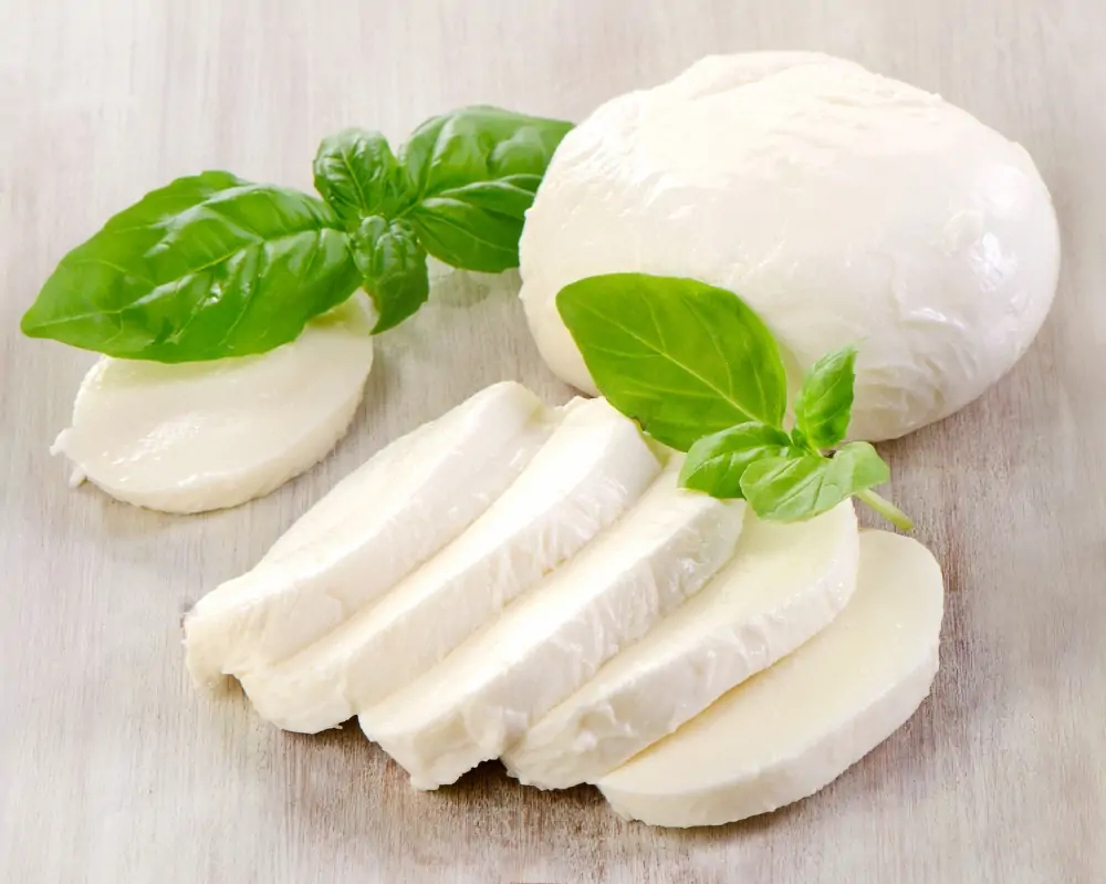 Mozzarella on a wooden table Selective focus